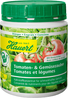 Eine Dose mit Dünger für schmackhaftes Gemüse
